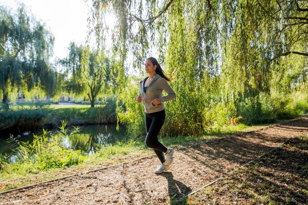 Fit woman jogging in nature